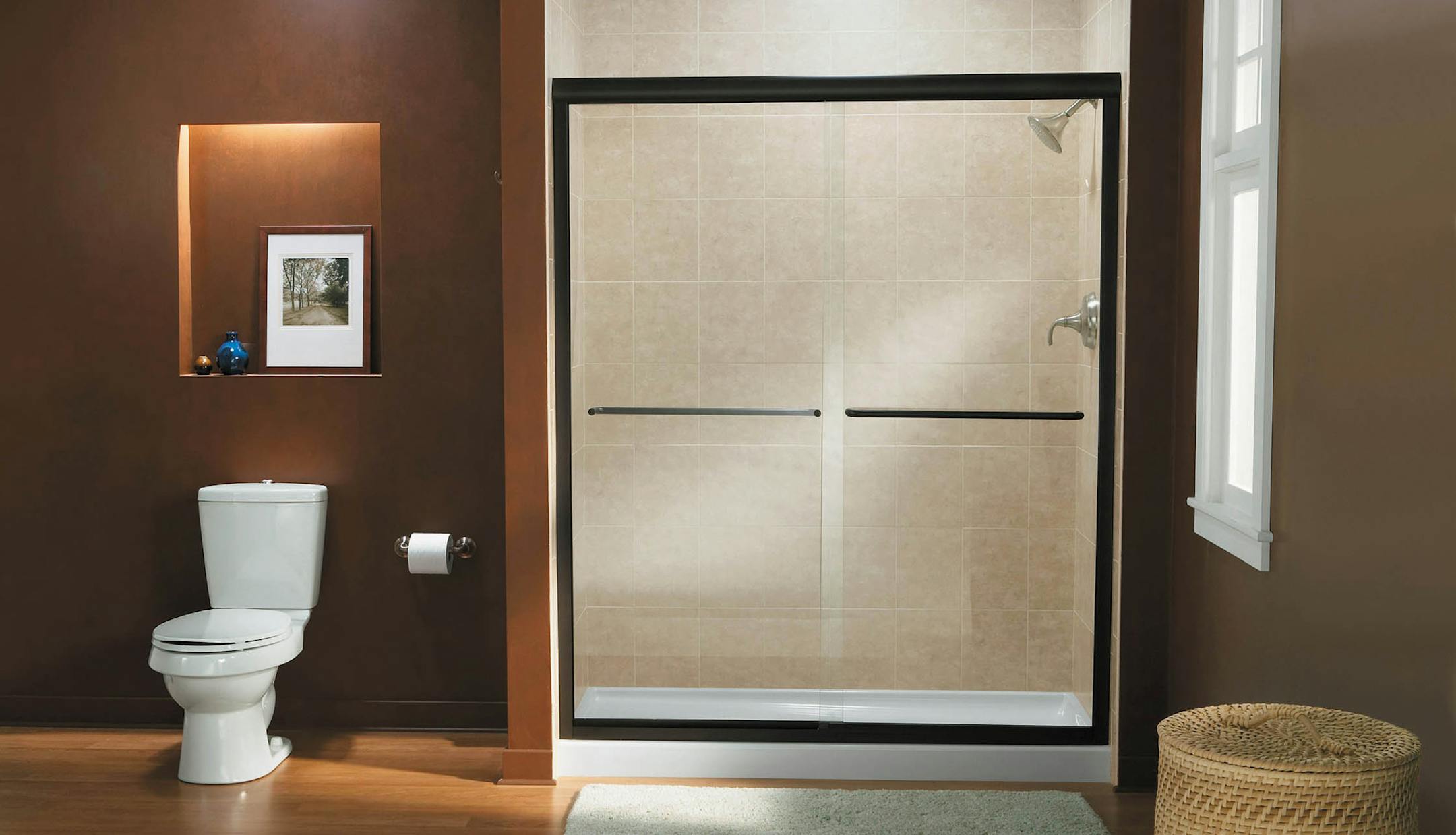 SH13G041PLUMBER July 8, 2013 -- A glass shower door adds a nice touch to the bathroom. (SHNS photo courtesy Kohler) (Newscom TagID: shnsphotos147088.jpg) [Photo via Newscom]