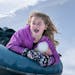 Emily Delahunt, 6, screamed with delight as she went down the Buck Hill tubing hill with her brother Sammy, 8 and their dad Terry. Emily and Sammy had