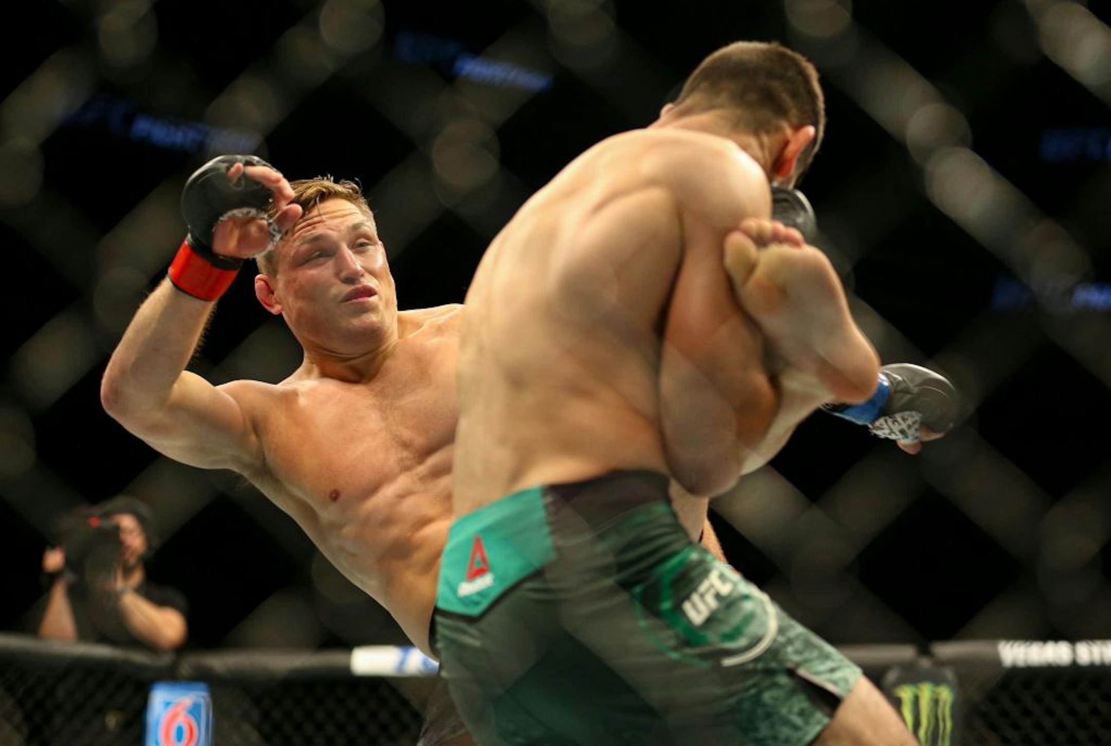 Drew Dober lands a high kick on Polo Reyes. Dober would go on to win the fight with a first round KO. ALEX KORMANN ¥ alex.kormann@startribune.com UFC Fight Night was held at Target Center on Saturday June 29, 2019. Francis Ngannou and Junior Dos Santos headlined the event.
