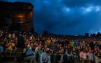 The crowd waits for "The Decemberists" to take to the stage for a performance at the Red Rocks Amphitheater on Tuesday, May 22, 2018 in Morrison, Colo