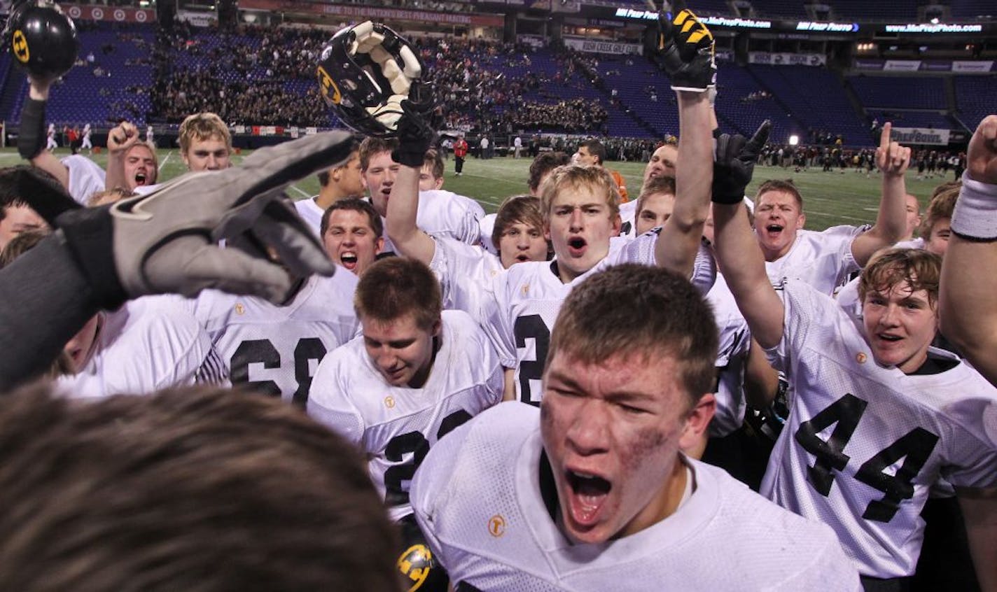 Hutchinson players celebrated their championship at the end of the game.