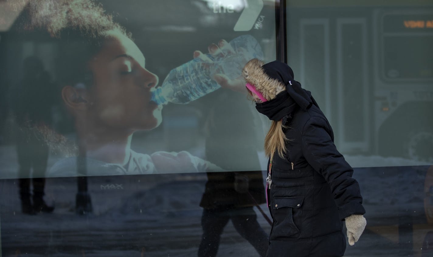 Sally Hellman was bundled up trying to protect herself from the cold air as she walked down Nicollet Mall in downtown Minneapolis.