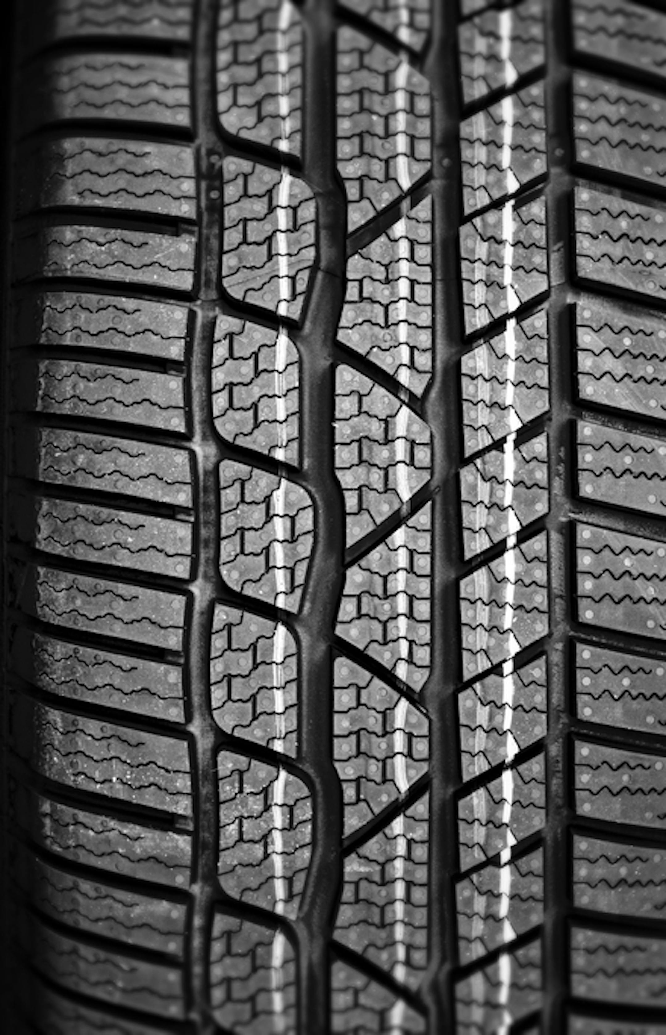 close up of new tire in a row
