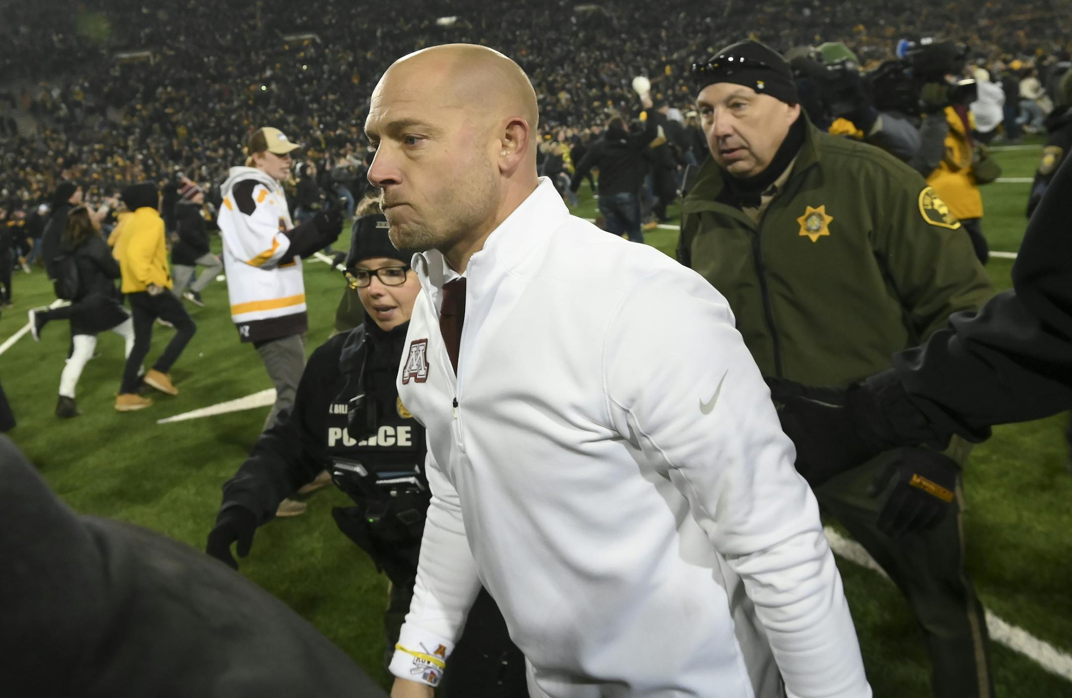 Minnesota Gophers head coach P.J. Fleck was escorted off the field by law enforcement following his team's 23-19 loss to the Iowa Hawkeyes. ] Aaron Lavinsky • aaron.lavinsky@startribune.com The Minnesota Gophers played the Iowa Hawkeyes on Saturday, Nov. 16, 2019 at Kinnick Stadium in Iowa City, IA.