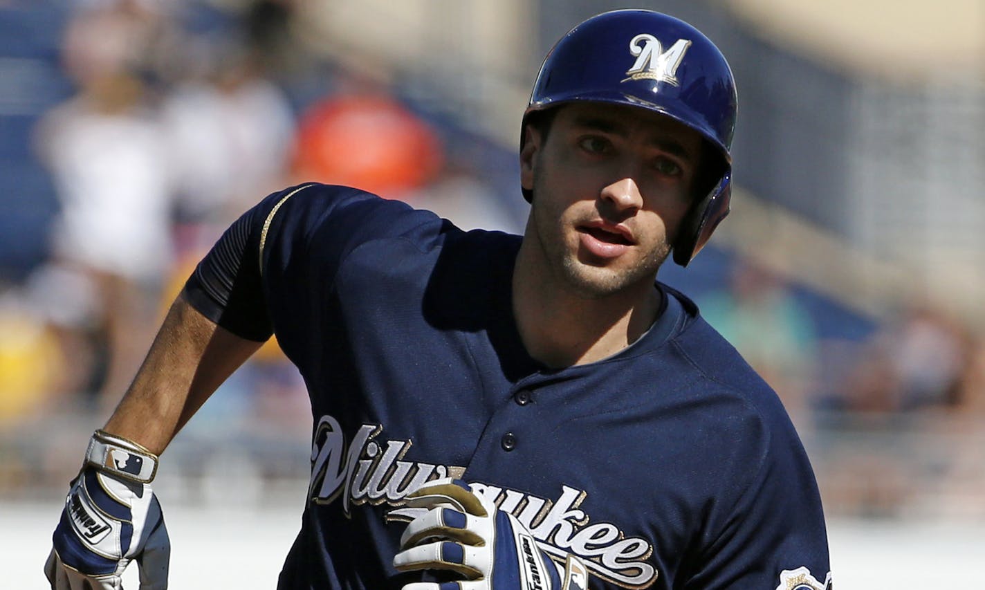 Milwaukee Brewers' Ryan Braun (8) rounds third after hitting a game-tying solo home run off Pittsburgh Pirates closer Jason Grilli during the ninth inning of a baseball game in Pittsburgh Sunday, April 20, 2014. The Brewers won in 14 innings 3-2. (AP Photo/Gene J. Puskar) ORG XMIT: PAGP122