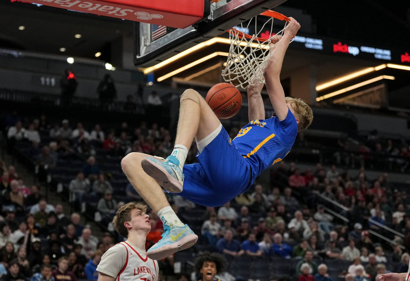 Wayzata guard Jackson McAndrew (23) dunks the ball in the second half. Wayzata High School defeated Lakeville North 79-77 in the class 4A boys state tournament semifinals at Target Center in Minneapolis, Minn., on Thursday, March 23, 2023. ] RENEE JONES SCHNEIDER • renee.jones@startribune.com