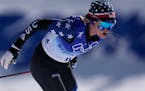 Jessie Diggins competes during the women's 30km mass start free cross-country skiing competition at the 2022 Winter Olympics, Sunday, Feb. 20, 2022, i