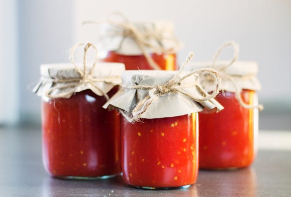 Homemade Tomato Sauce in a Jars. Canning tomatoes. from istock