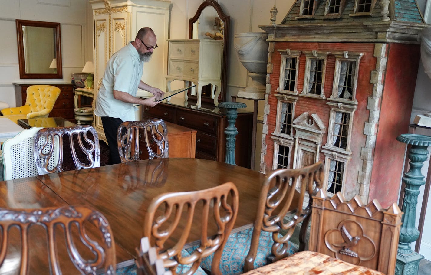 Jonathan Campbell arranged contents of Pillsbury mansion, recently demolished on Lake Minnetonka, that will go up for sale this weekend at H & B Gallery. The house on the right is an original prop from The Guthrie.] ANTHONY SOUFFLE &#xef; anthony.souffle@startribune.com Contents of Pillsbury mansion, recently demolished on Lake Minnetonka, that will go up for sale this weekend sat Wednesday, Sept. 5, 2018 at H & B Gallery in Minneapolis.