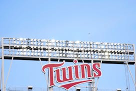 Signage at Target Field is viewed before a baseball game between the Minnesota Twins and the San Francisco Giants, Friday, Aug. 26, 2022, in Minneapol