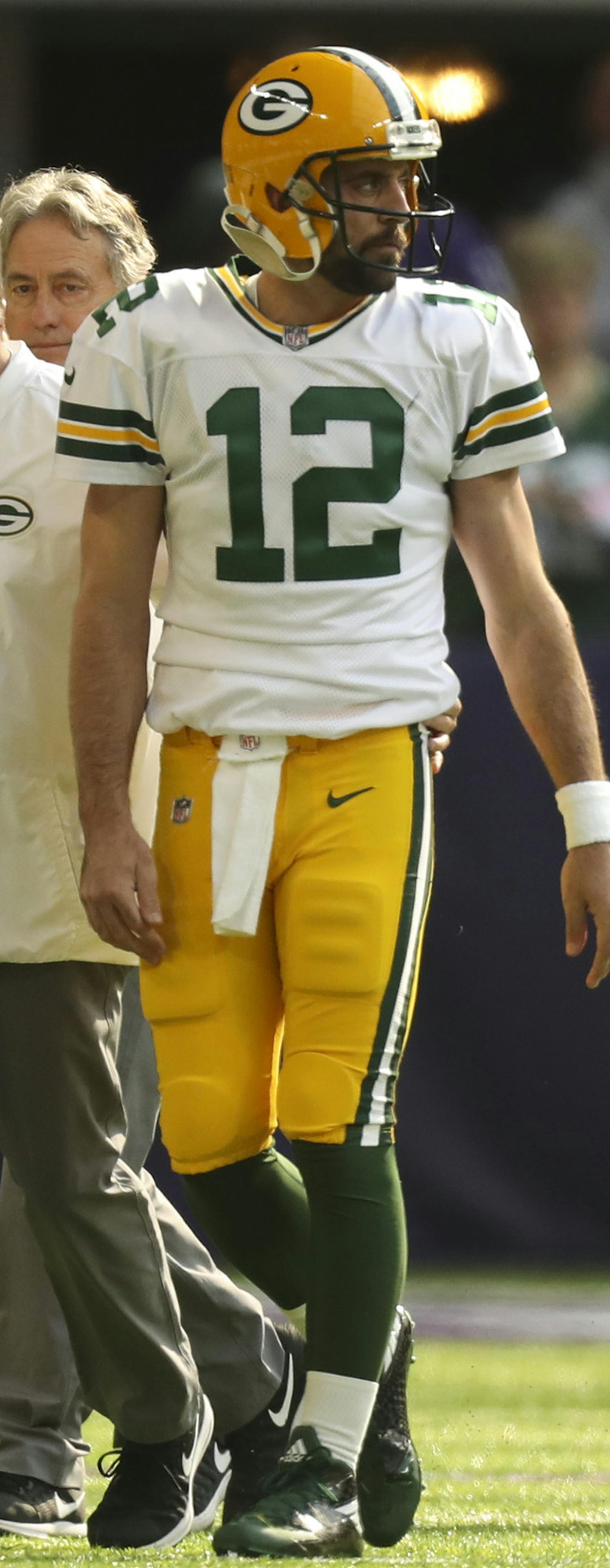 Green Bay Packers quarterback Aaron Rodgers looked over at the Vikings sideline after after he took a hard hit from the Vikings' Anthony Barr in the first quarter, breaking his right collarbone. ] JEFF WHEELER ï jeff.wheeler@startribune.com The Minnesota Vikings met the Green Bay Packers in an NFL football game Sunday afternoon, October 15, 2017 at U.S. Bank Stadium in Minneapolis.
