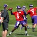 Vikings quarterbacks, including rookie Teddy Bridgewater (center) gets the once over from offensive coordinator Norv Turner at OTA's Wednesday morning