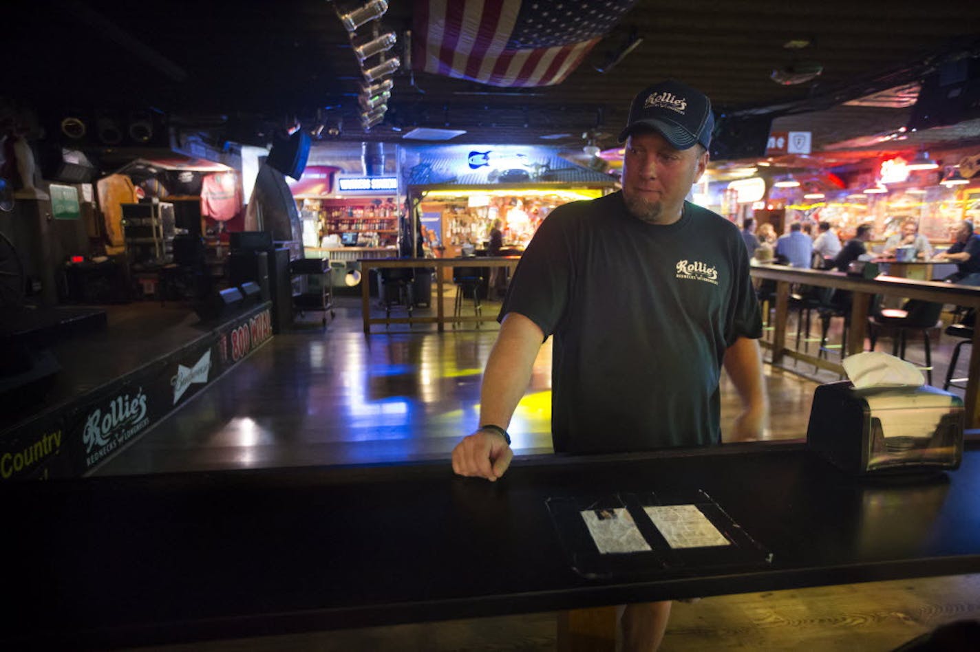 Rollie Hogrefe, owner of Rollie's Rednecks and Longnecks in Sauk Rapids, has an extensive collection of Confederate memorabilia on display.