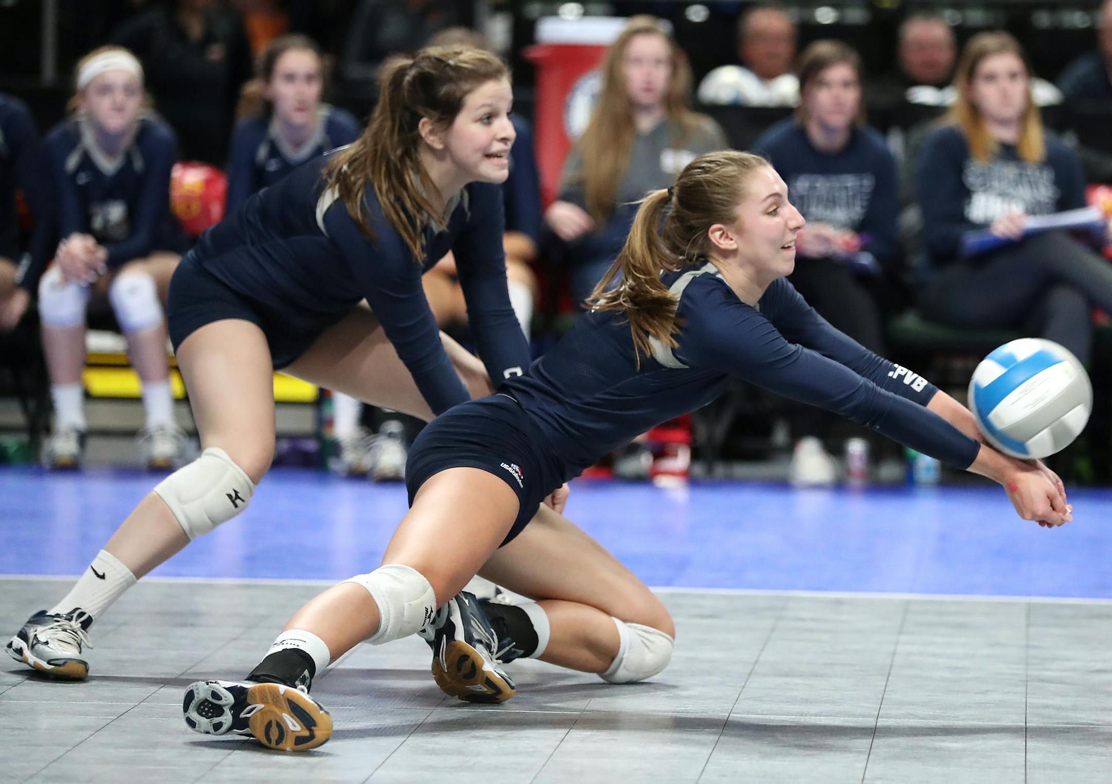 Champlin Park's Sydney Hilley (2) digs the ball. ] (Leila Navidi/Star Tribune) leila.navidi@startribune.com BACKGROUND INFORMATION: Champlin Park High School against Roseville Area High School in the Class 3A volleyball quarterfinals at the Xcel Energy Center in St. Paul on Thursday, November 10, 2016.