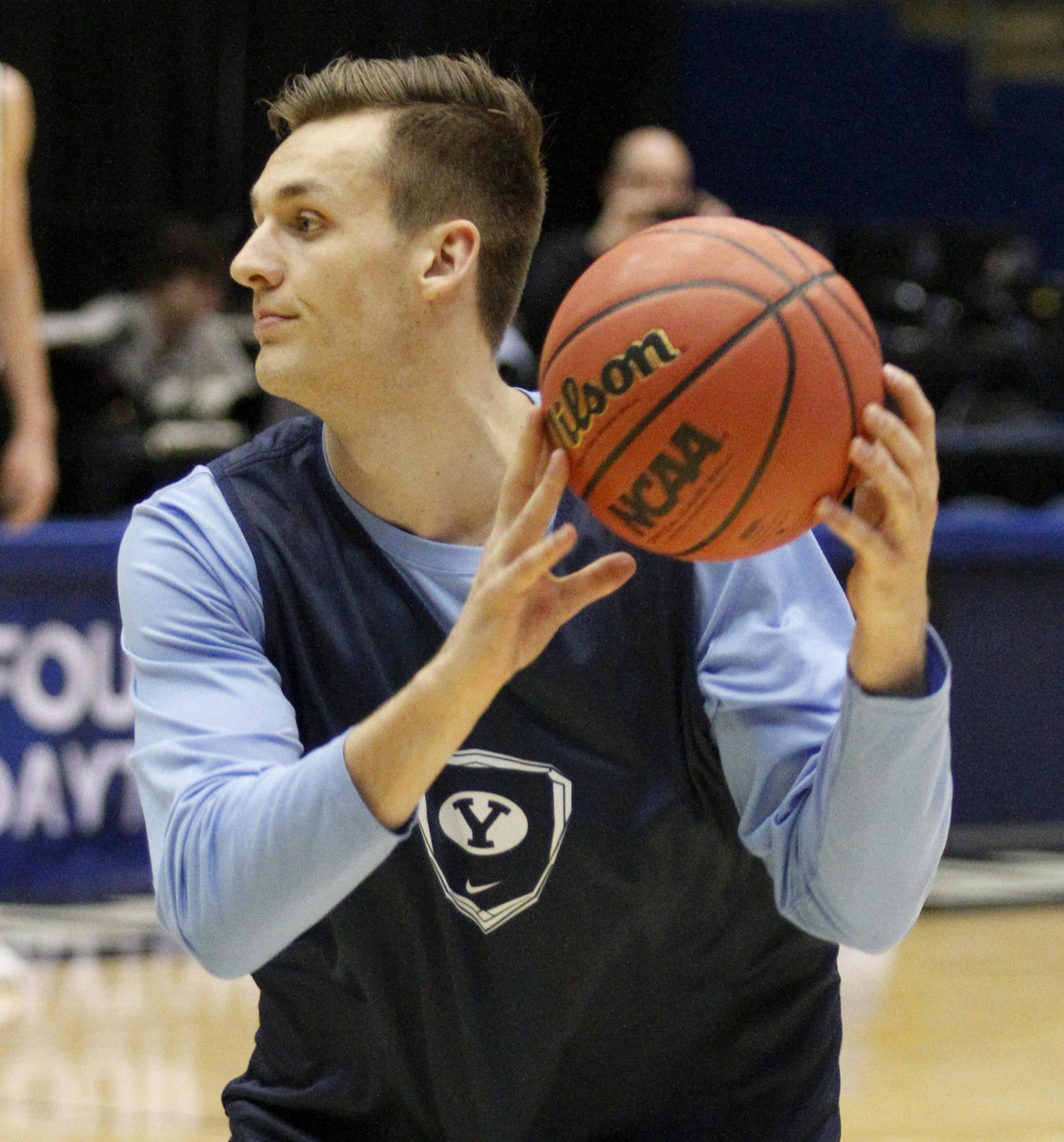 BYU' Kyle Collinsworth sets a play during practice for an NCAA college basketball first round game Monday, March 16, 2015, in Dayton, Ohio. BYU will play Mississippi in Dayton on Tuesday. (AP Photo/Skip Peterson)
