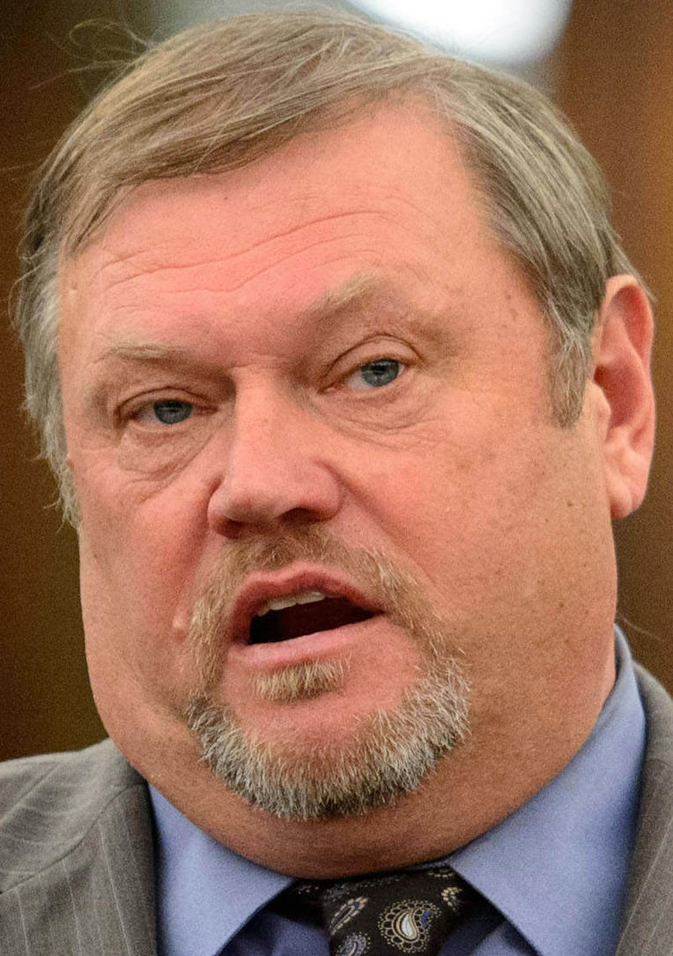 FILE - In this Feb. 19, 2014 file photo, Senate Majority Leader Thomas Bakk talks with other Minnesota legislative leaders about the agenda for the upcoming legislative session in St. Paul, Minn. While talks go on about about possible tax cuts with the state's budget surplus, Bakk, D-Cook, said he'll insist on building a bigger reserve as final negotiations arrive this year. (AP Photo/The Star Tribune, Glen Stubbe,File)