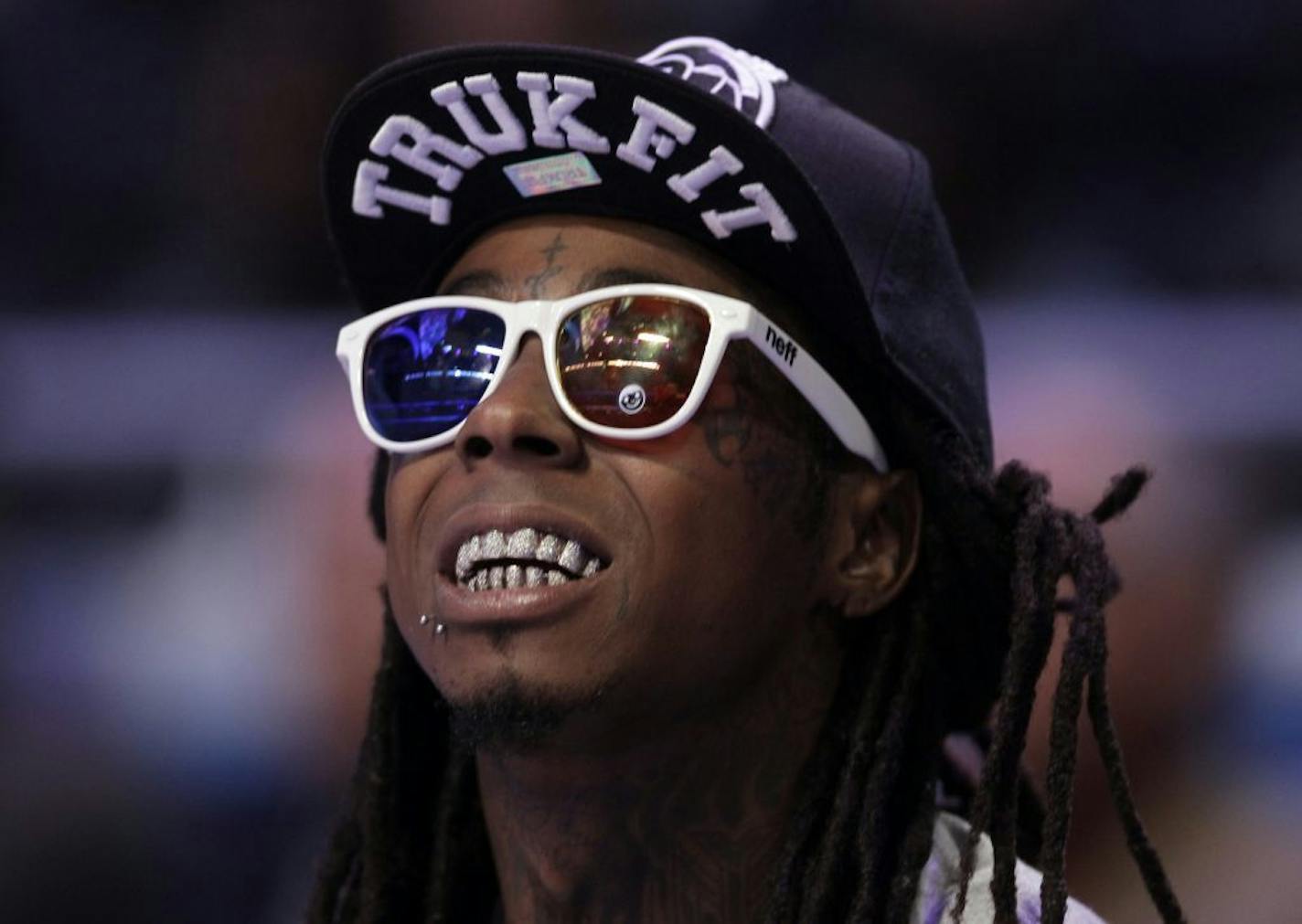 Rapper Lil Wayne enjoyed the NBA All-Star basketball game in 2012.