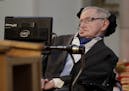 Britain's Professor Stephen Hawking delivers a keynote speech as he receives the Honorary Freedom of the City of London during a ceremony at the Guild