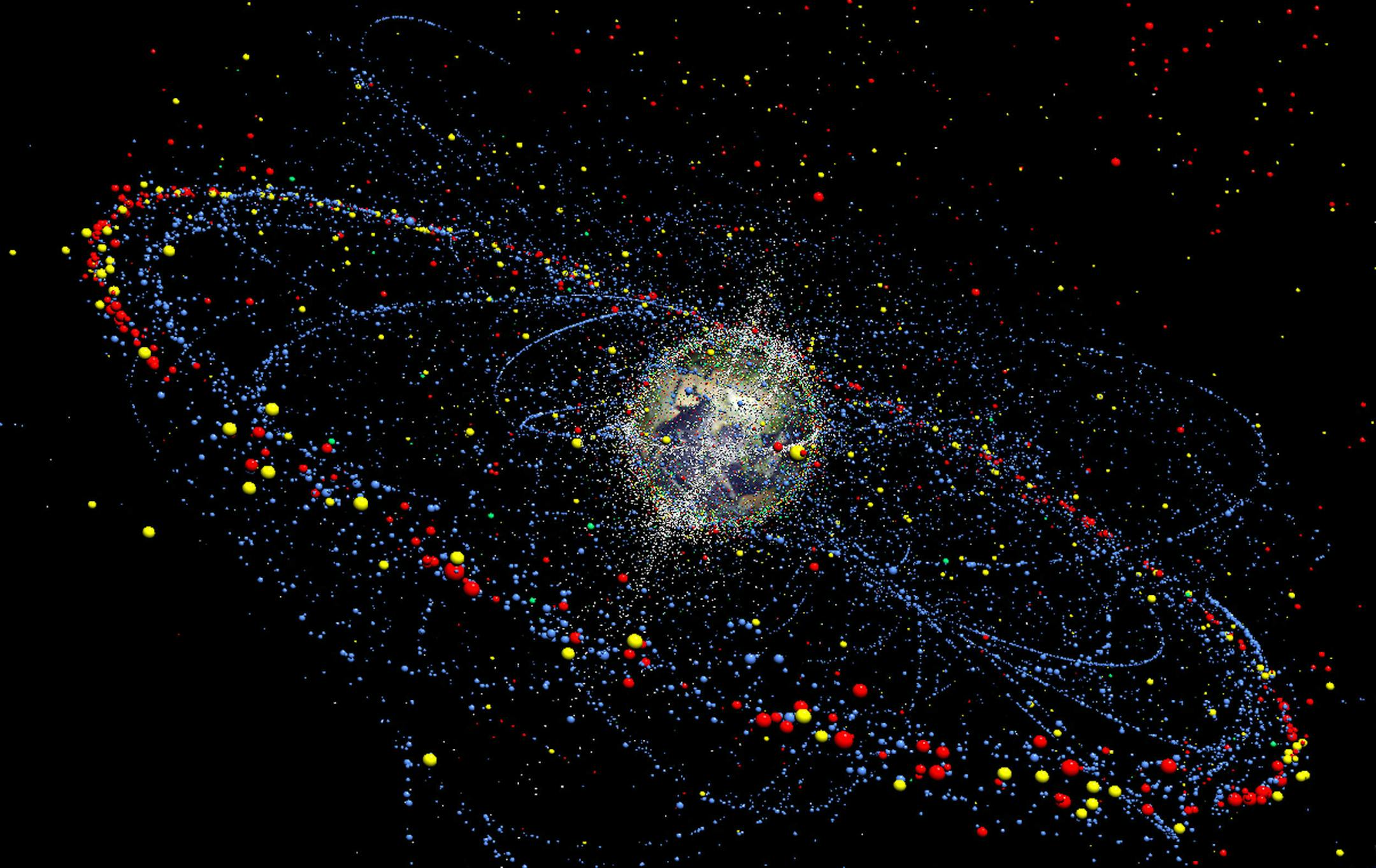 FILE - An undated handout photo for the European Space Agency ESA shows a computer simulation made by the Institute for Air and Spacesystems at the Technical University of Braunschweig, Germany, of the distribution and movement of space debris at present and in future. (AP Photo/TU Braunschweig, File)