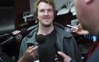 At the Xcel Energy Center where players and coaches packed up for the offseason, goalie Devan Dubnyk took questions from reporters.] Richard Tsong-Taa