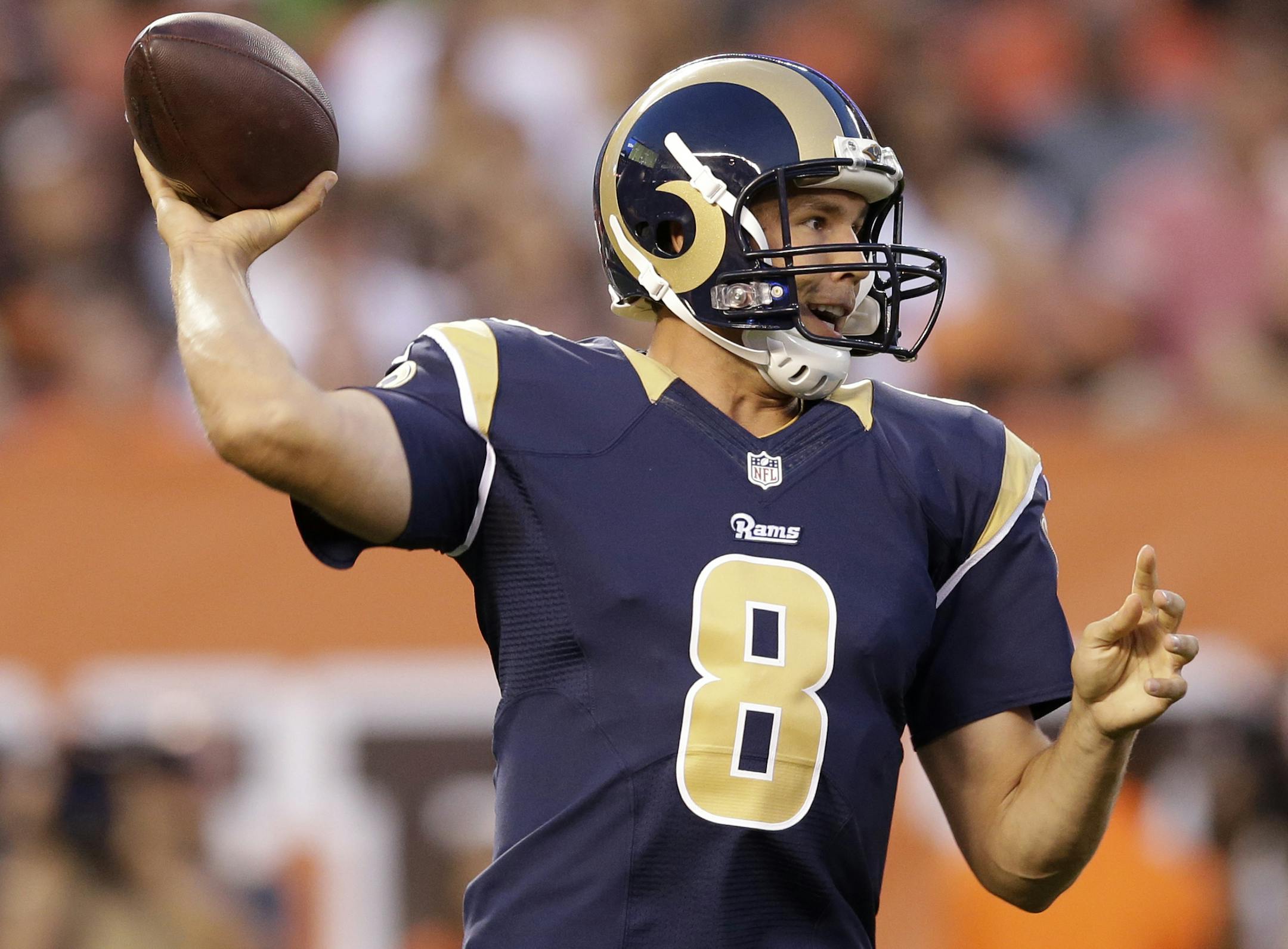 St. Louis Rams quarterback Sam Bradford passes in the first quarter of a preseason NFL football game against the Cleveland Browns Saturday, Aug. 23, 2014, in Cleveland. (AP Photo/Tony Dejak) ORG XMIT: CDS