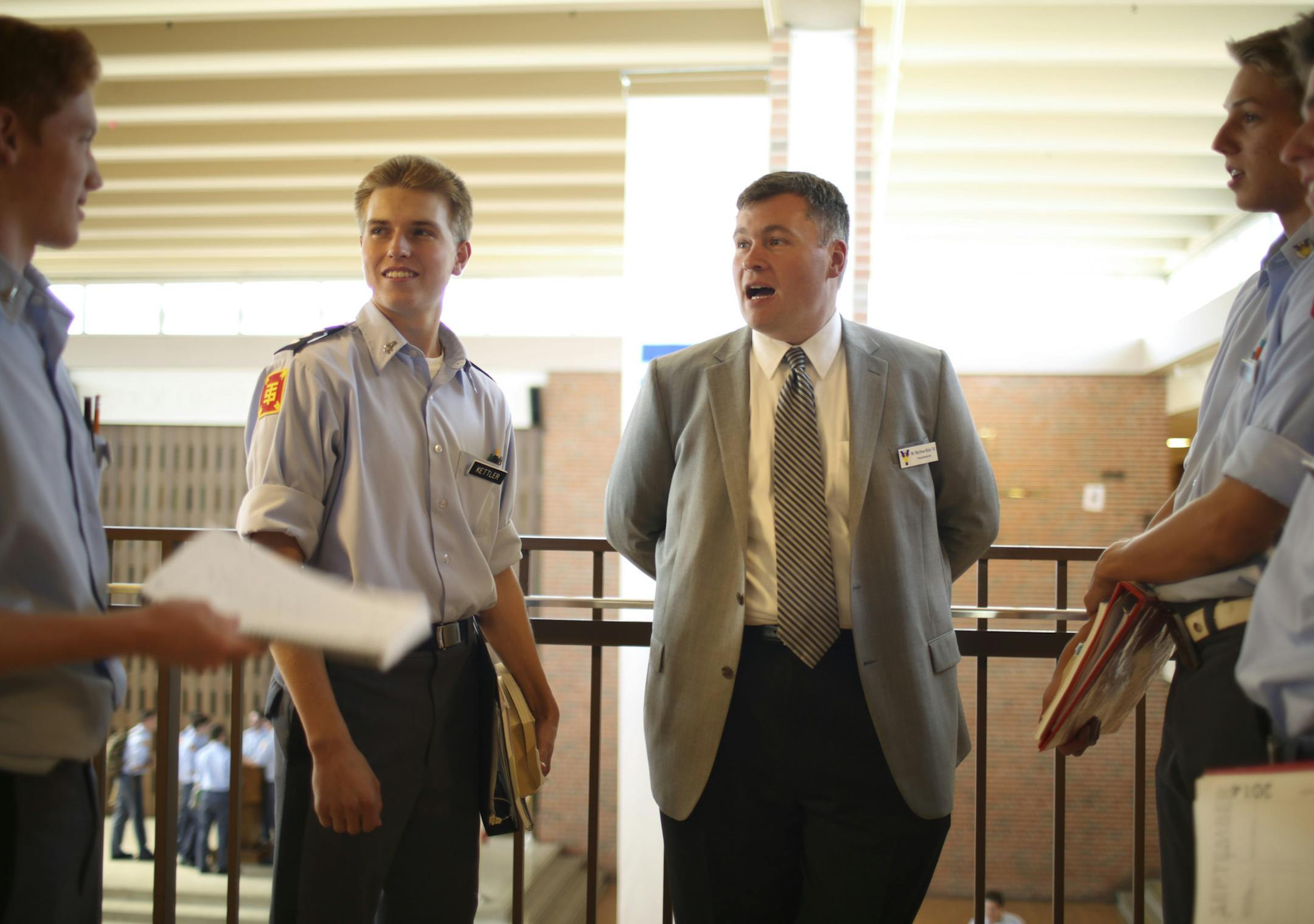 New St. Thomas Academy headmaster Matt Mohs talking with four seniors after classes Tuesday afternoon at the Mendota Heights school. The guys are, from left, Nick Walsh, Chris Kettler, Ryan Jacobsen, and Connor Knapp. ] JEFF WHEELER &#x201a;&#xc4;&#xa2; jeff.wheeler@startribune.com St. Thomas Academy has a new headmaster, Matt Mohs, an alumnus who worked previously as the CAO for St. Paul Public Schools. Mohs was photographed at the end of the school day on Tuesday, September 2, 2014 in Mendota
