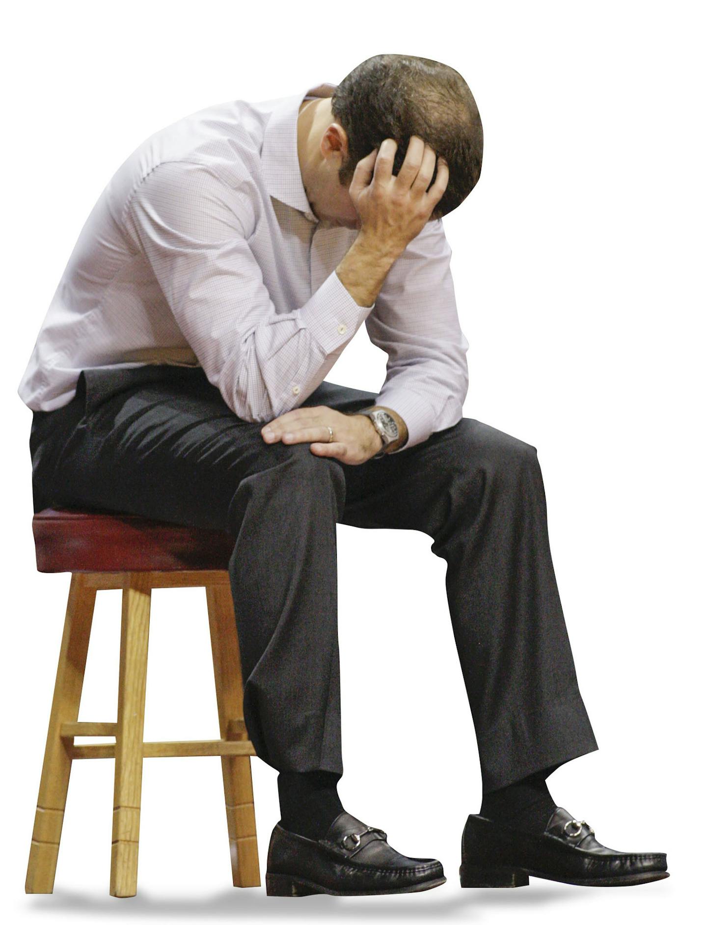 Minnesota head coach Richard Pitino holds his head near the end Minnesota's 85-81 double-overtime loss to South Dakota during an NCAA college basketball game, Saturday, Dec. 5, 2015, in Minneapolis. (AP Photo/Paul Battaglia) ORG XMIT: MIN2016011518081487 ORG XMIT: MIN1601151810231440