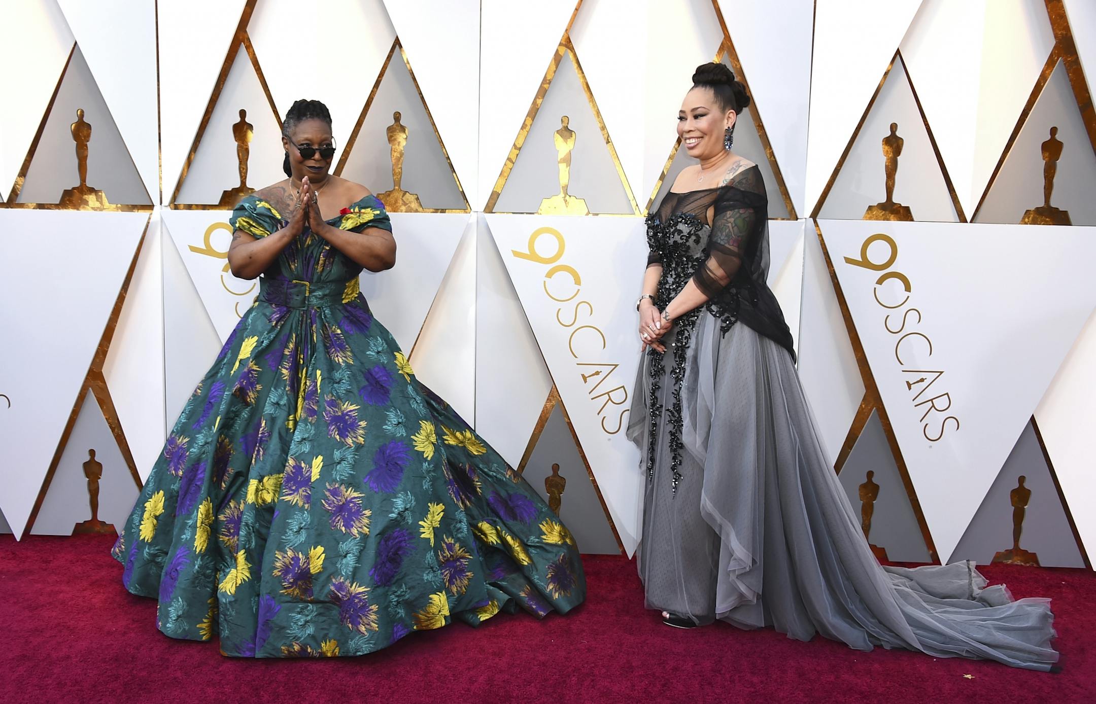 Whoopi Goldberg, left, and Alex Martin arrive at the Oscars on Sunday, March 4, 2018, at the Dolby Theatre in Los Angeles.