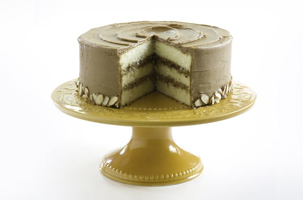 Cook's Country magazine paired its Minnehaha Cake Frosting with a white layer cake.
