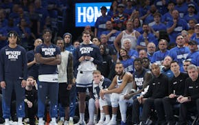 Timberwolves players watch as Game 2 winds down, the team suffering a 118-103 loss at Paycom Center in Oklahoma City.