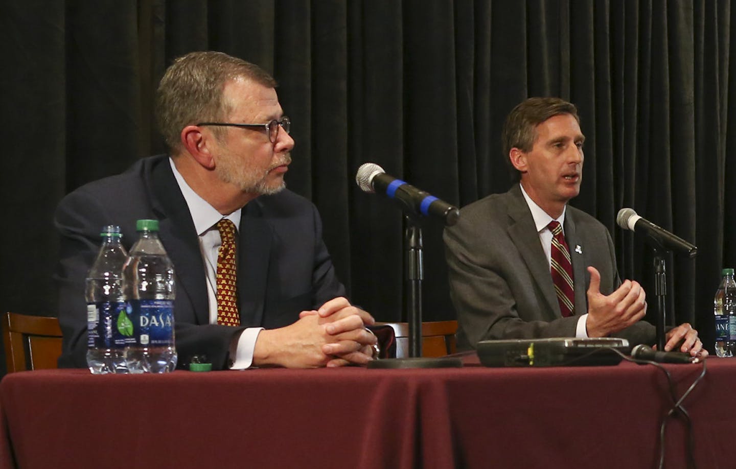 Former Syracuse Athletic Director Mark Coyle, shown with President Eric Kayler, left, answered questions after he was introduced as the new AD of the University of Minnesota at a news conference Wednesday afternoon at TCF Bank Stadium. ] JEFF WHEELER &#xef; jeff.wheeler@startribune.com Former Syracuse Athletic Director Mark Coyle was introduced as the new AD at the University of Minnesota at a news conference Wednesday afternoon, May 11, 2016 at the M Club room at TCF Bank Stadium