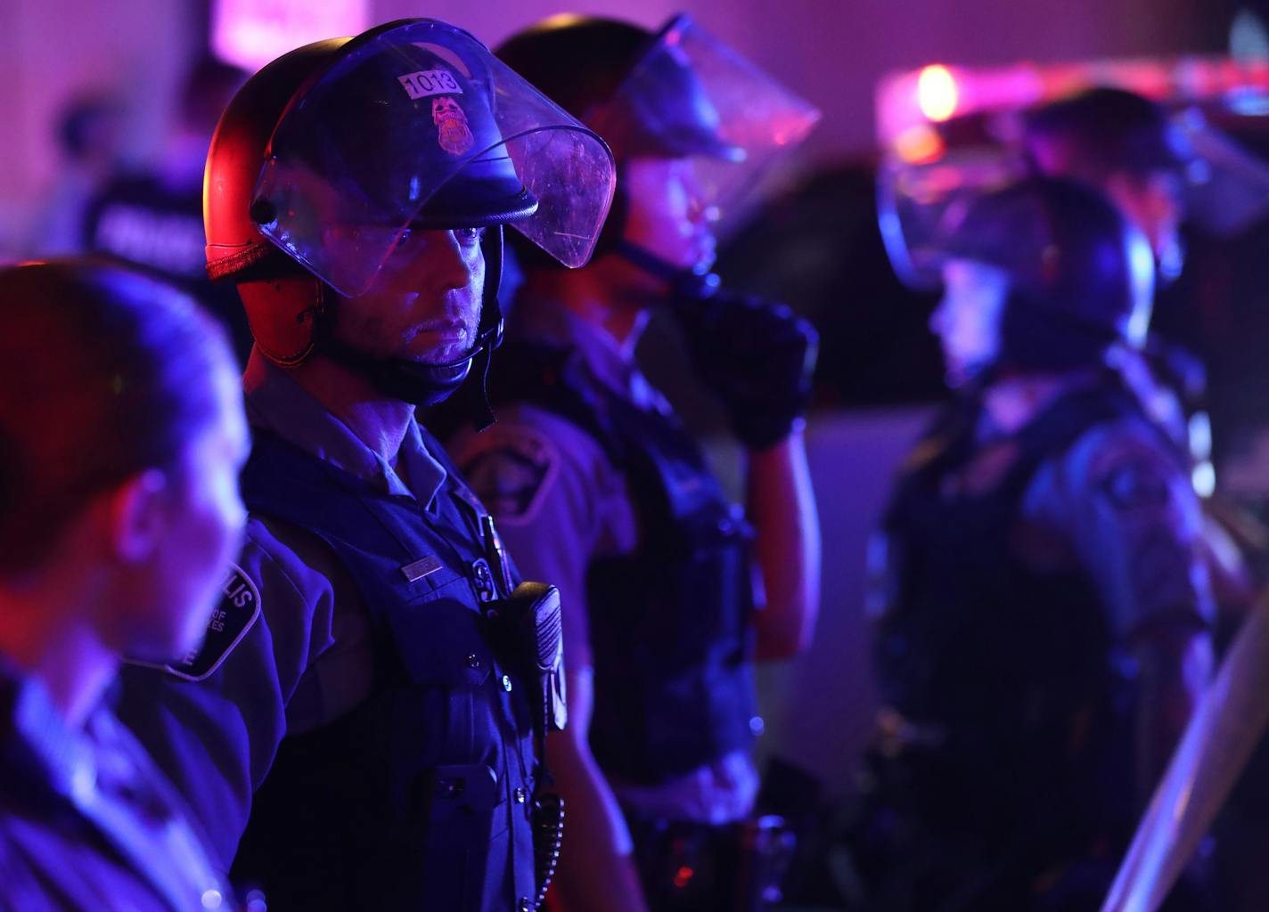 Minneapolis police secured an intersection along 7th St. during unrest near Nicollet Mall Wednesday evening in Minneapolis.