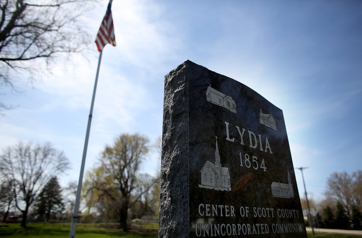 A town marker sat on a grassy corner near its center. ] (KYNDELL HARKNESS/STAR TRIBUNE) kyndell.harkness@startribune.com In Lydia Min., Wednesday, April 15, 2014.