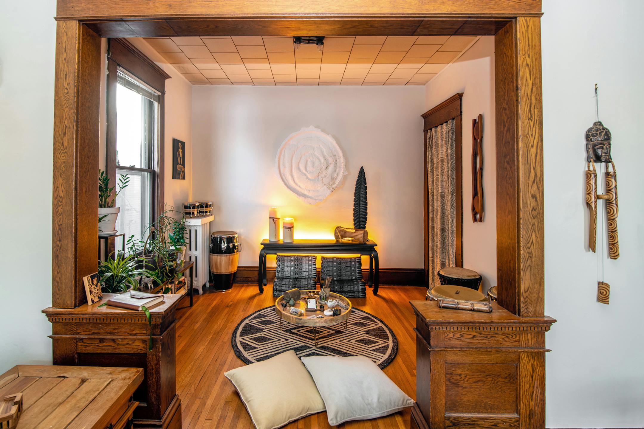 An LED light strip painted the color of candlelight adds a warm glow to the back of a console.