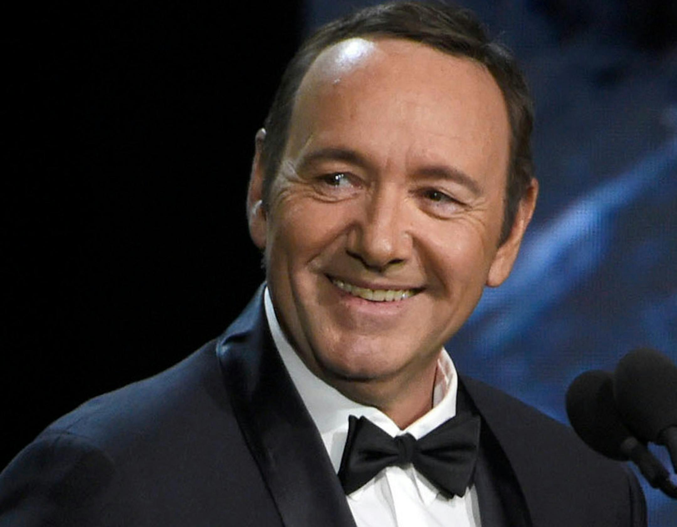 FILE - In this Oct. 27, 2017 file photo, Kevin Spacey presents the award for excellence in television at the BAFTA Los Angeles Britannia Awards in Beverly Hills, Calif. Spacey has made his first public appearance since being accused of sexual assault, reading a poem about a worn-out boxer in a Rome museum. Standing next to a Greek bronze statue of a battered boxer in the National Roman Museum on Friday, Aug. 2, 2019, Spacey dramatically intoned Italian poet Gabriele Tinti’s poem ‘&