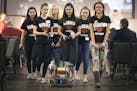 Members of the FTC Rubies All-girls Minneapolis public school FTC team marched in the 6th annual Robotics Alley conference and Expo,Tuesday at the Dep