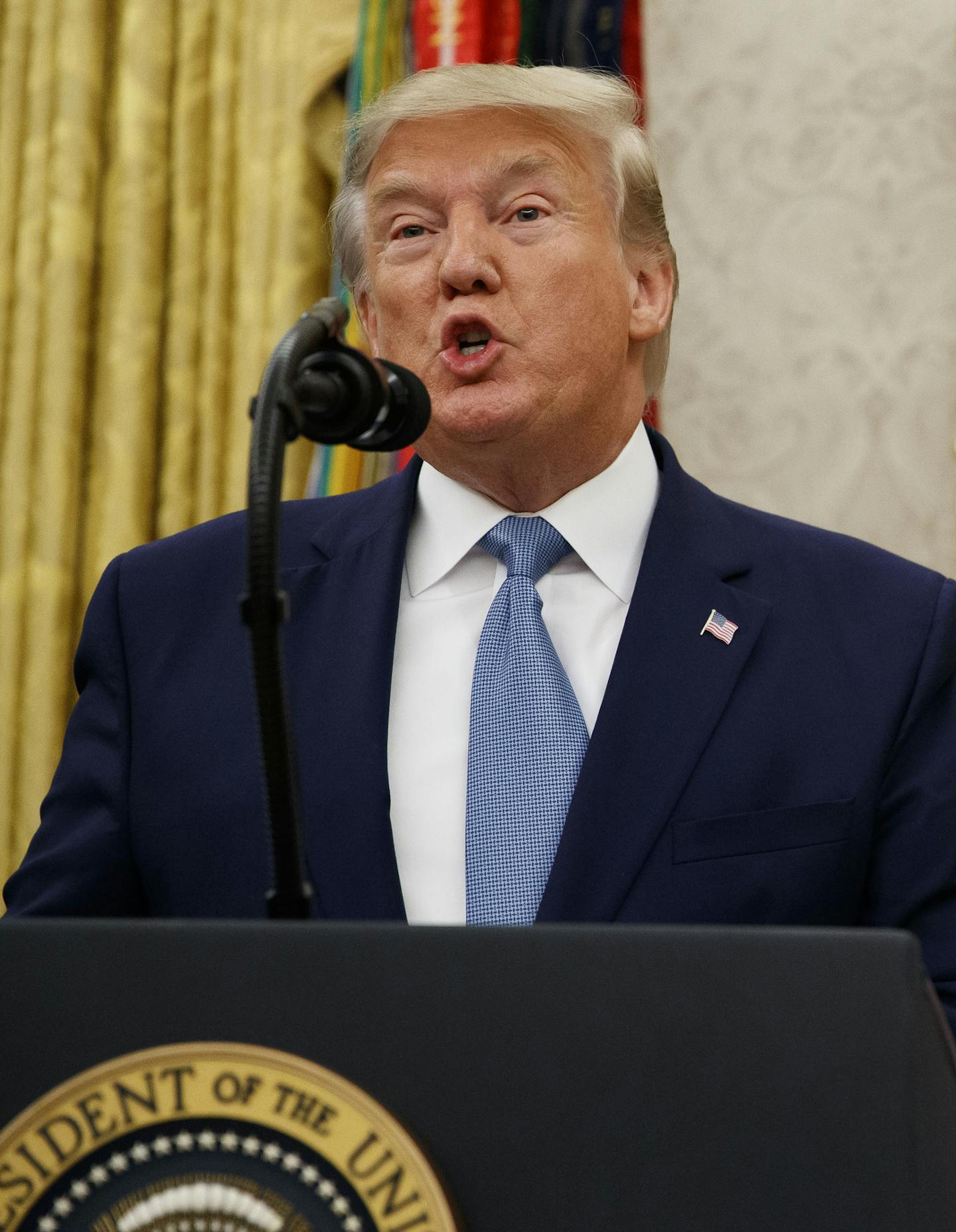 President Donald Trump speaks during a ceremony to present the Presidential Medal of Freedom to former Attorney General Edwin Meese, in the Oval Office of the White House, Tuesday, Oct. 8, 2019, in Washington. (AP Photo/Alex Brandon)