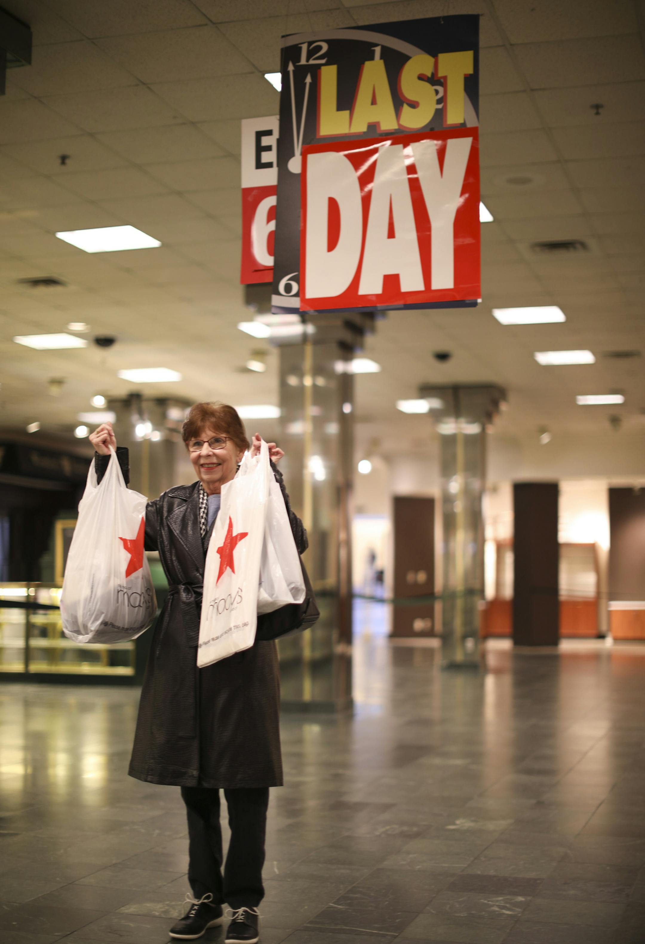 Mary Fehring took the train to Minneapolis from Milaca to shop at Dayton's (Macy's) on final time. She held up her shopping bags so her husband to take her picture on the second floor. "I found a pair of slacks and a lot of junk for 95% off," she said. "I wanted to buy an elf, but I didn't think we could get it back on the train." ] JEFF WHEELER ï jeff.wheeler@startribune.com The Macy's store in downtown Minneapolis was open one last day Sunday, for bargain hunters and nostalgia seekers who