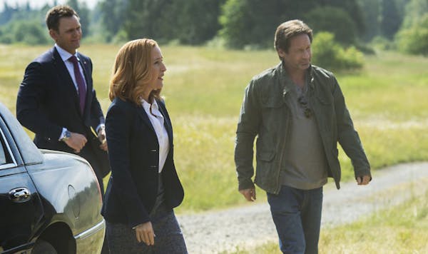 Joel McHale, left, Gillian Anderson and David Duchovny in &#x201c;The X-Files.&#x201d;