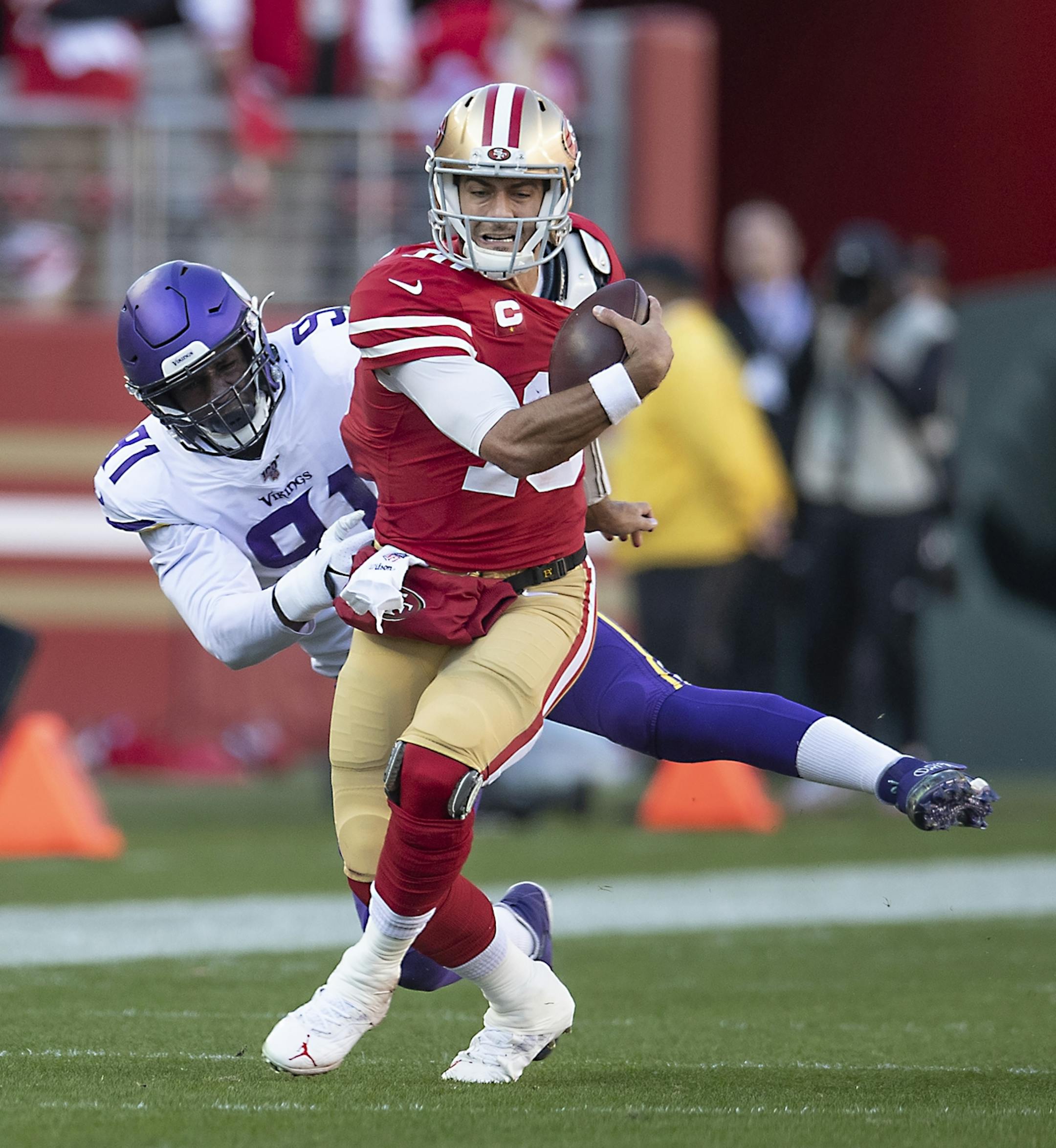 Minnesota Vikings defensive end Stephen Weatherly sacked San Francisco 49ers quarterback Jimmy Garoppolo in the first quarter.