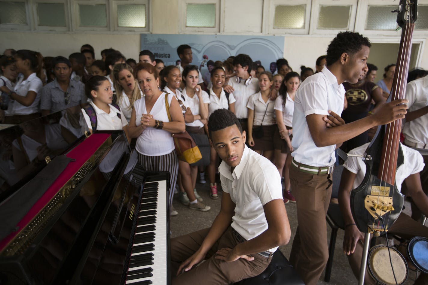 Student Dayton Perez waits at the piano to perform for the Minnesota Orchestra at the Escuela Nacional de Musica in Havana, Cuba on Thursday, May 14, 2015. ] LEILA NAVIDI leila.navidi@startribune.com /