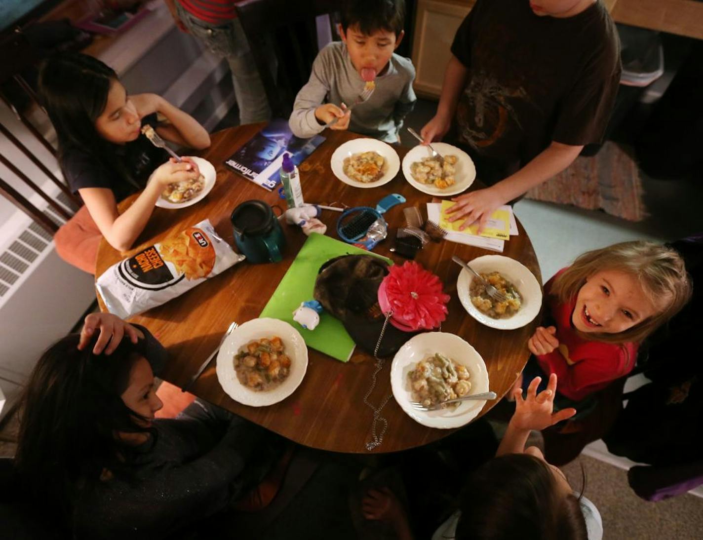 Alexis Goodsky, right, enjoyed lunch with her family at their home in Duluth.