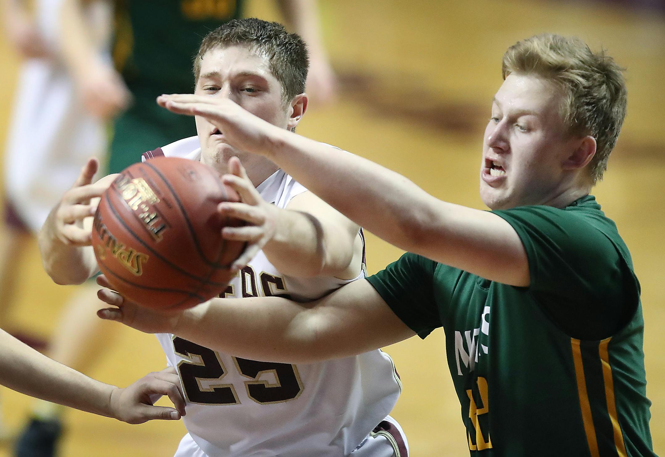 Springfield's Kale Meandering, left, and Nevis' Zach Henry battled for the ball during the second period of their match up of the boys' basketball Class 1A quarterfinals at Williams Arena, Thursday, March 23, 2017 in Minneapolis, MN. ] ELIZABETH FLORES &#xef; liz.flores@startribune.com