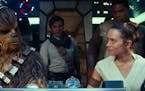 This image released by Disney/Lucasfilm shows, from left, Joonas Suotamo as Chewbacca, Oscar Isaac as Poe Dameron, Daisy Ridley as Rey and John Boyega