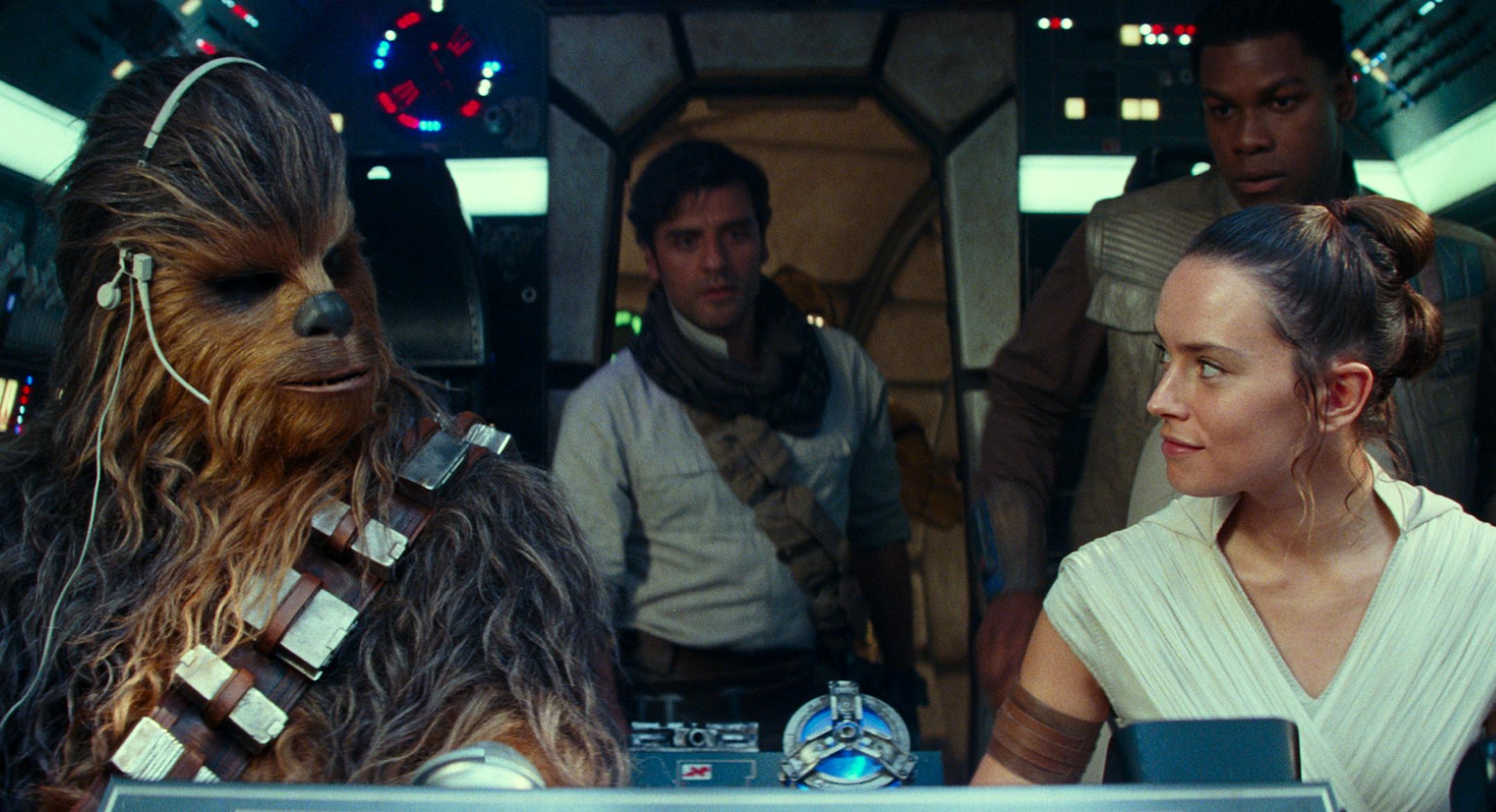 This image released by Disney/Lucasfilm shows, from left, Joonas Suotamo as Chewbacca, Oscar Isaac as Poe Dameron, Daisy Ridley as Rey and John Boyega as Finn in a scene from "Star Wars: The Rise of Skywalker." (Disney/Lucasfilm Ltd. via AP)