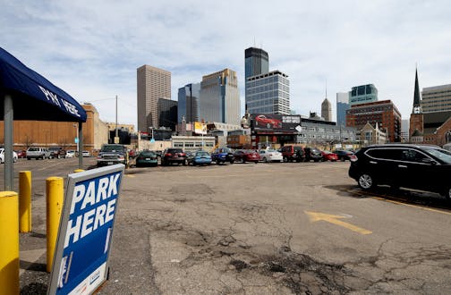 Surface parking at 1022 Hennepin Ave, Minneapolis, MN ] JOELKOYAMA&#x201a;&#xc4;&#xa2;jkoyama@startribune Minneapolis, MN on March 28, 2014. One of the most common and blighting elements of Minneapolis' urban core, surface parking lots, are about to face some extra scrutiny from City Hall. Council Member Jacob Frey, who represents half of downtown, is pushing for more enforcement of the city's landscaping ordinances for surface parking lots. Surface parking lots are the enemy of many a city plan