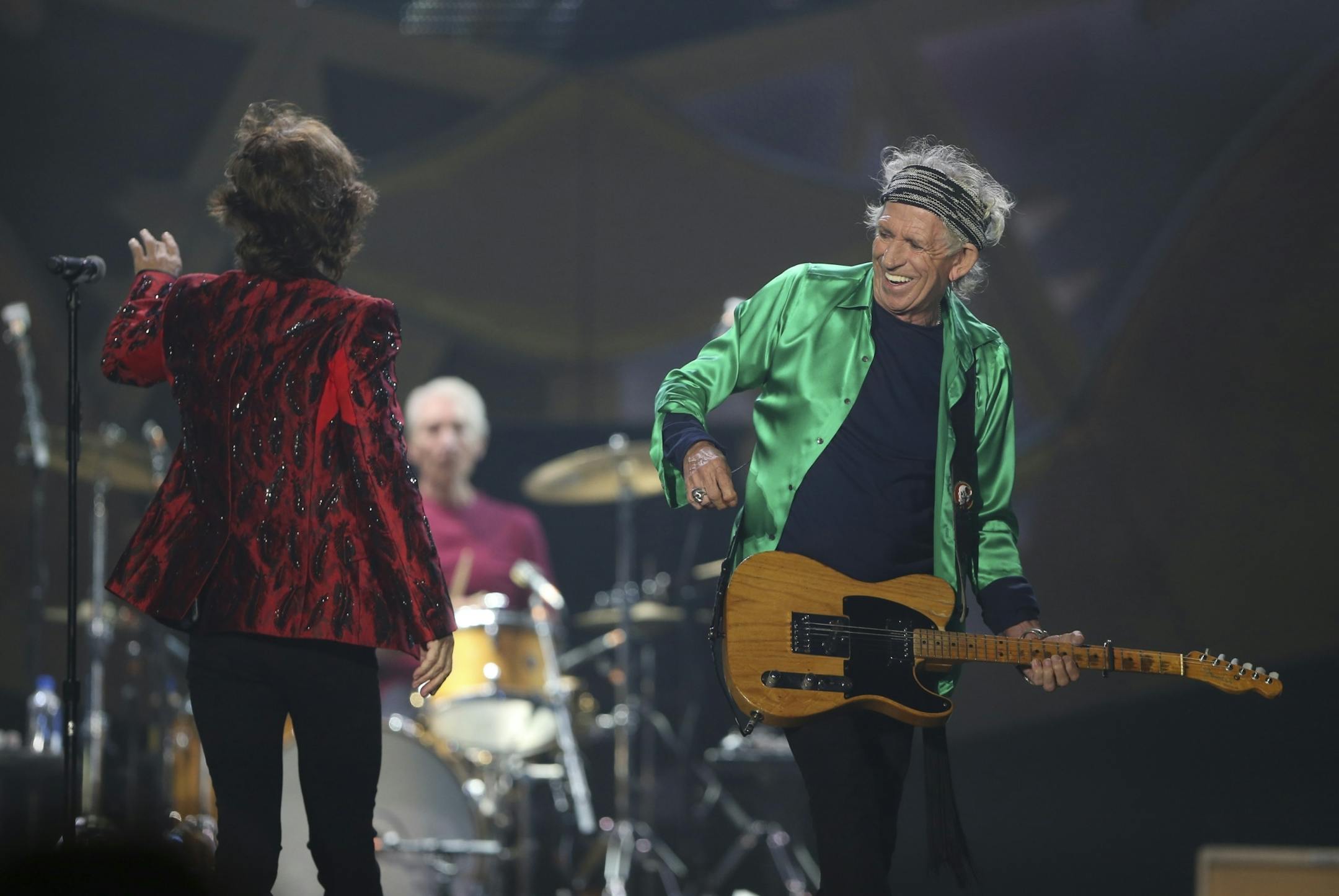 Keith Richards grinned as Mick Jagger walked past early in the Rolling Stones' show at TCF Bank Stadium Wednesday night.