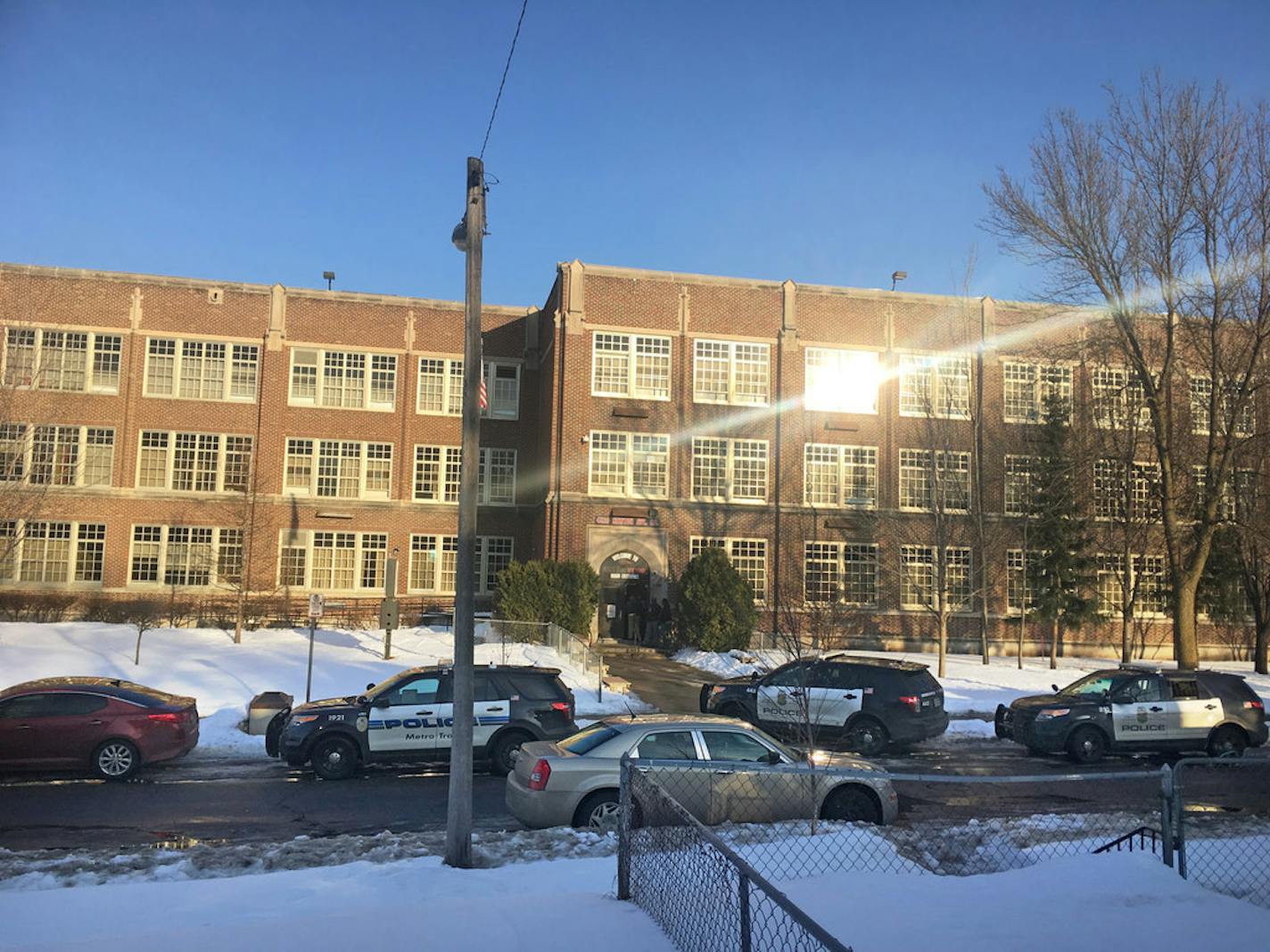 Patrick Henry High School in Minneapolis was put on lockdown Tuesday, after a person with a gun was seen stepping off a bus nearby.