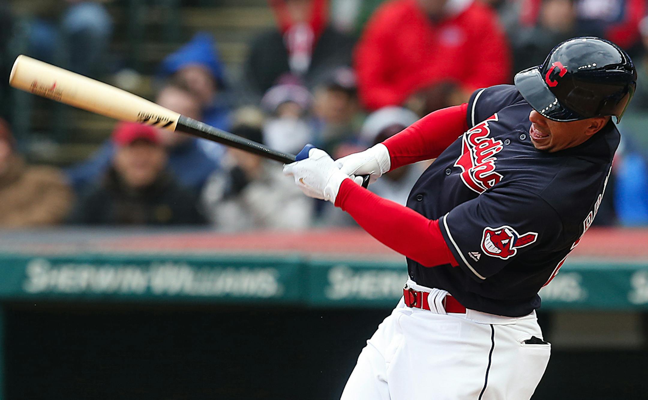 The Cleveland Indians' Michael Brantley hits a two-run single against the Kansas City Royals in the first inning on Friday, April 6, 2018, at Progressive Field in Cleveland. The Indians won, 3-2. (Leah Klafczynski/Akron Beacon Journal/TNS)
