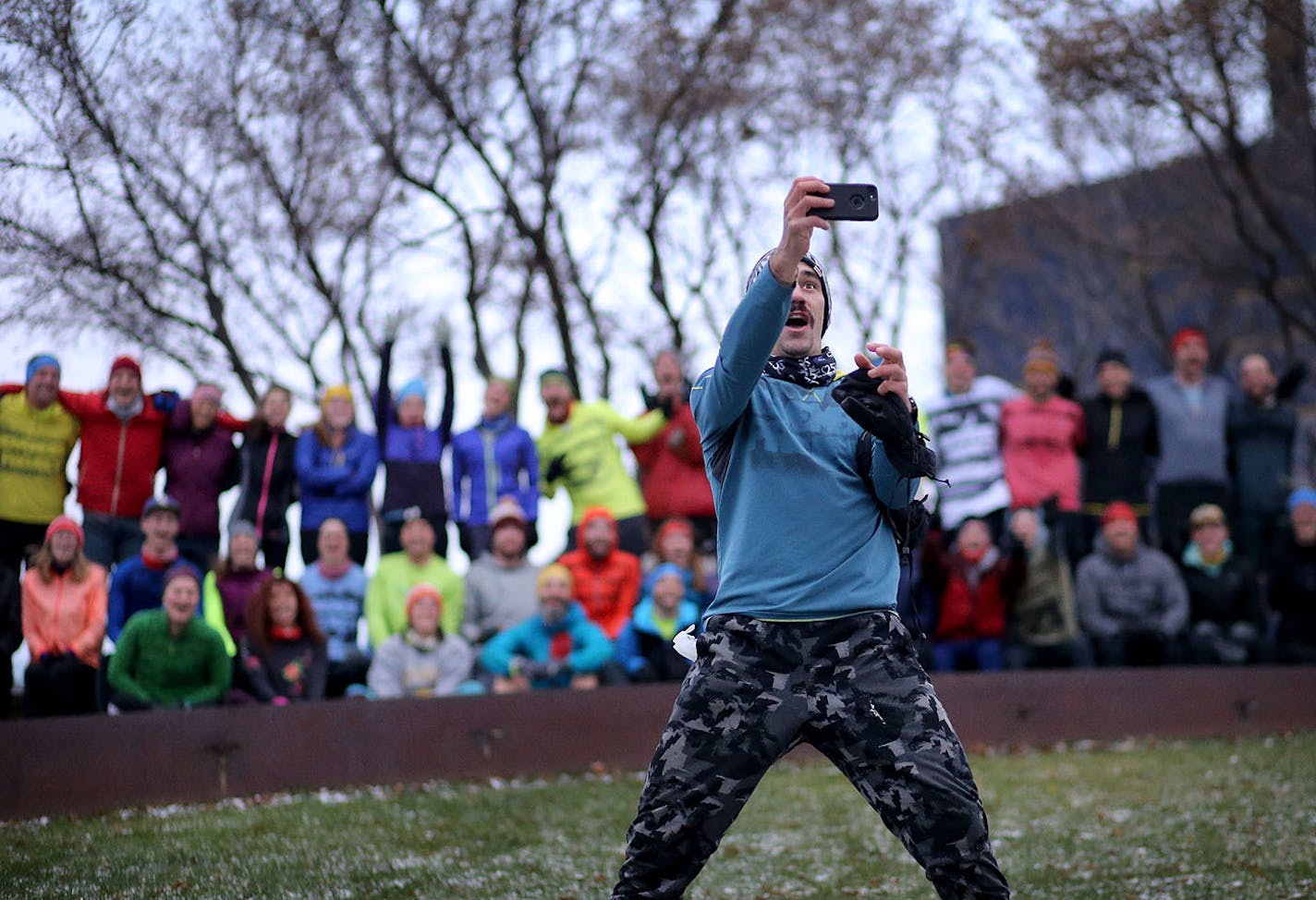 Putting Gold Medal Park to use — like it did Nov. 7 — is habit for the November Project participants. Co-leader Ben Bauch, right, followed up with a group selfie.